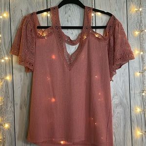 Size L. Off the shoulder open back laced sun baked orange colored tank top.